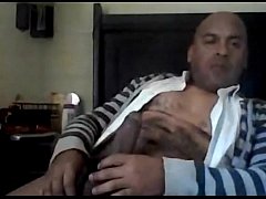 Hairy Mature Gay Strokes His Uncut Cock On Cam