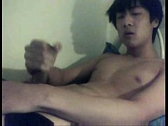 Asian Twink Rubs His Stiff Hairy Cock On The CB